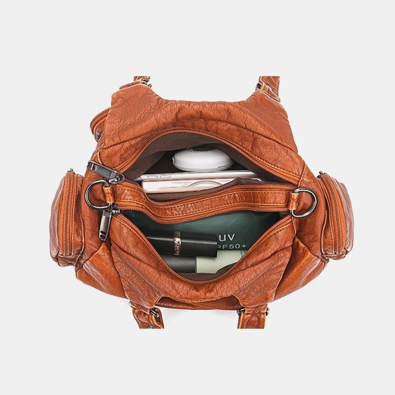 Dame Pu Læder Stor Kapacitet Nittedekoration Med Flere Lommer Retro Soft Tote Håndtasker Crossbody Tasker